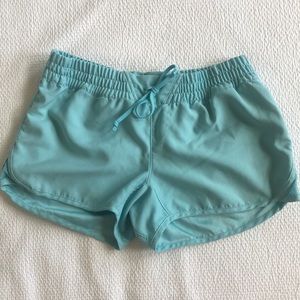 Turquoise Columbia fishing or exercise shorts